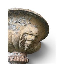 19th century terracotta campana shape urn planter, egg-and-dart moulded rim over a cherub-mask and gadrooned underbelly, turned pedestal and socle on square base