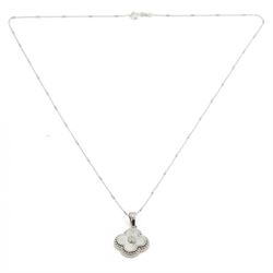 Silver cubic zirconia and mother of pearl flower head pendant necklace, stamped 925