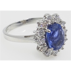  White gold unheated oval sapphire and diamond cluster ring, hallmarked 18ct, sapphire approx 1.7 carat, diamonds approx 0.6 carat  