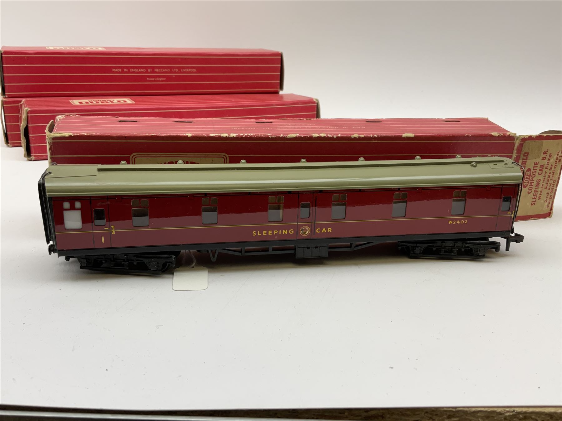 Hornby Dublo - six coaches comprising 4060 Open Corridor Coach 1st Class W.R.; 4061 Open Corridor Coach 2nd Class W.R.; 4062 Open Corridor Coach 1st Class B.R.; 4063 Open Corridor Coach 2nd Class B.R.; 4075 Passenger Brake Van B.R.;and 4078 Composite Sleeping Car B.R.; all in boxes (6)