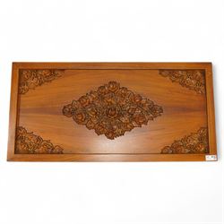 Hardwood rectangular coffee table, carved with trailing branches with foliage and flower heads, on scroll carved cabriole feet 
