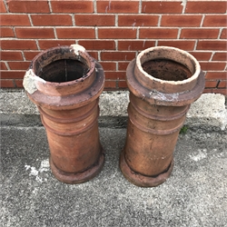 Two Victorian terracotta chimney pots, H73cm