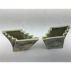 Pair of Carn Pottery Penzance vases of fan form, with tube lined floral and stylised decoration, stamped and marked X9 to base, H11.5cm