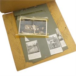 Enid Blyton - scrapbook with signed postcards from Enid Blyton, newspaper cuttings etc. containing five signatures