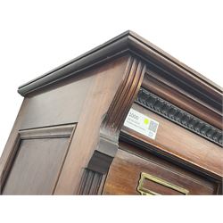 The Shannon Limited - late Victorian walnut filing cabinet, fitted with twenty-four small filing drawers, each with brass handle with label holder, fluted uprights, double cupboard below enclosed by two panelled doors, on turned feet, with brass plaque inscribed 'The Shannon, Limited, Ropemaker St. London, E.C.'