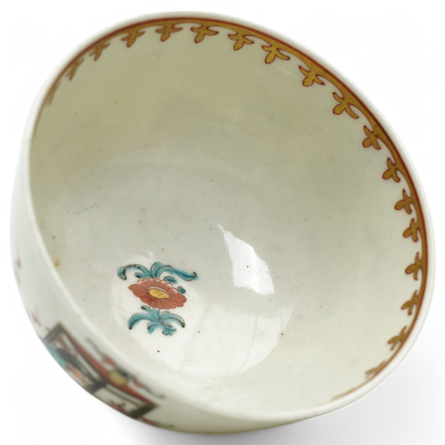 18th century Worcester trio, comprising coffee cup, small bowl and saucer, decorated with a Chinese scene of a flower seller in polychrome enamels, within gilt spearhead borders, saucer D12cm (3)