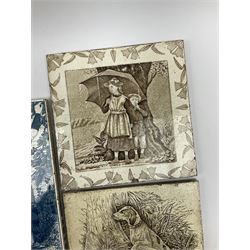 Maw & Co tile depicting a blue and white scene of two young girls picking fruit, together with two Josiah Wedgwood & Sons Etruria tiles, one decorated with a young girl and boy under an umbrella 'April', the other decorated with a hunting scene. (3).
