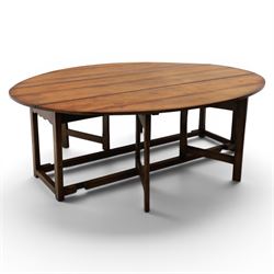Large 18th century style oak wake table, with drop leaves and gateleg action on turned supports extends to 178 cm 