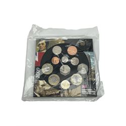 The Royal Mint United Kingdom 2009 brilliant uncirculated eleven coin set, including Kew Gardens fifty pence, in card folder