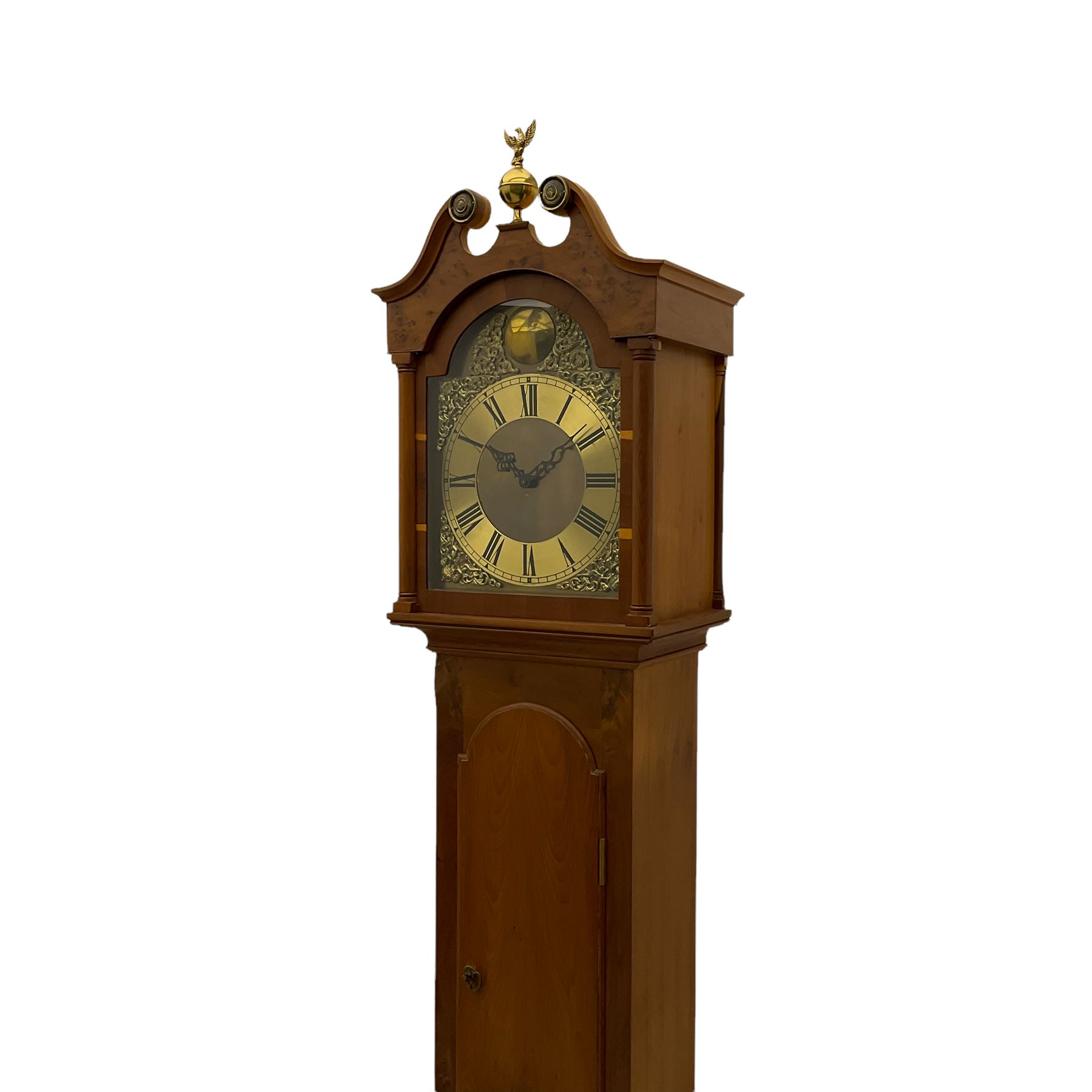 A bespoke handmade 20th century longcase clock in a slim Yew wood case with a German three train weight driven movement sounding the hours and quarters on 12 gong rods, with a brass break-arch dial, cast brass spandrels and an etched chapter ring, Roman numerals and minute track, dial engraved 'Parkinson Liner',  convex boss to the arch engraved 'Tempus Fugit', strike silent facility, With triple weights & Pendulum. 


