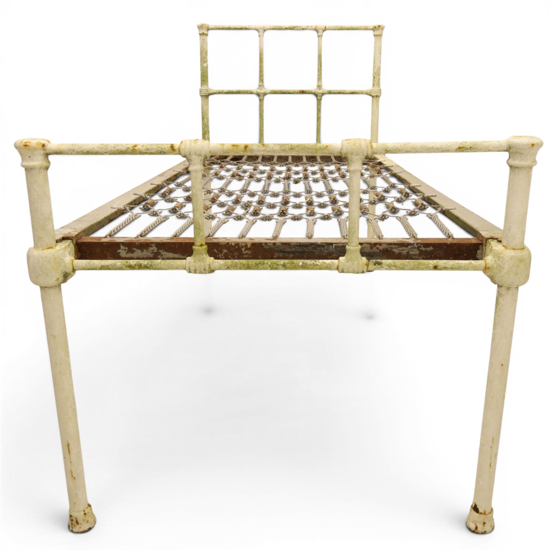 19th century wrought iron single bed, white frame with knot details, frame with wire and spring supports