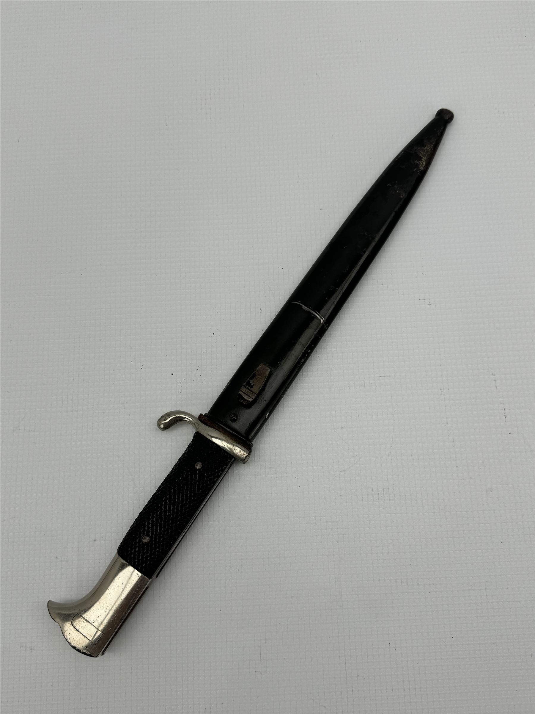 German Third Reich bayonet, the steel blade stamped E & F Horster, Solingen with black plastic chequered grip scales, L35cm