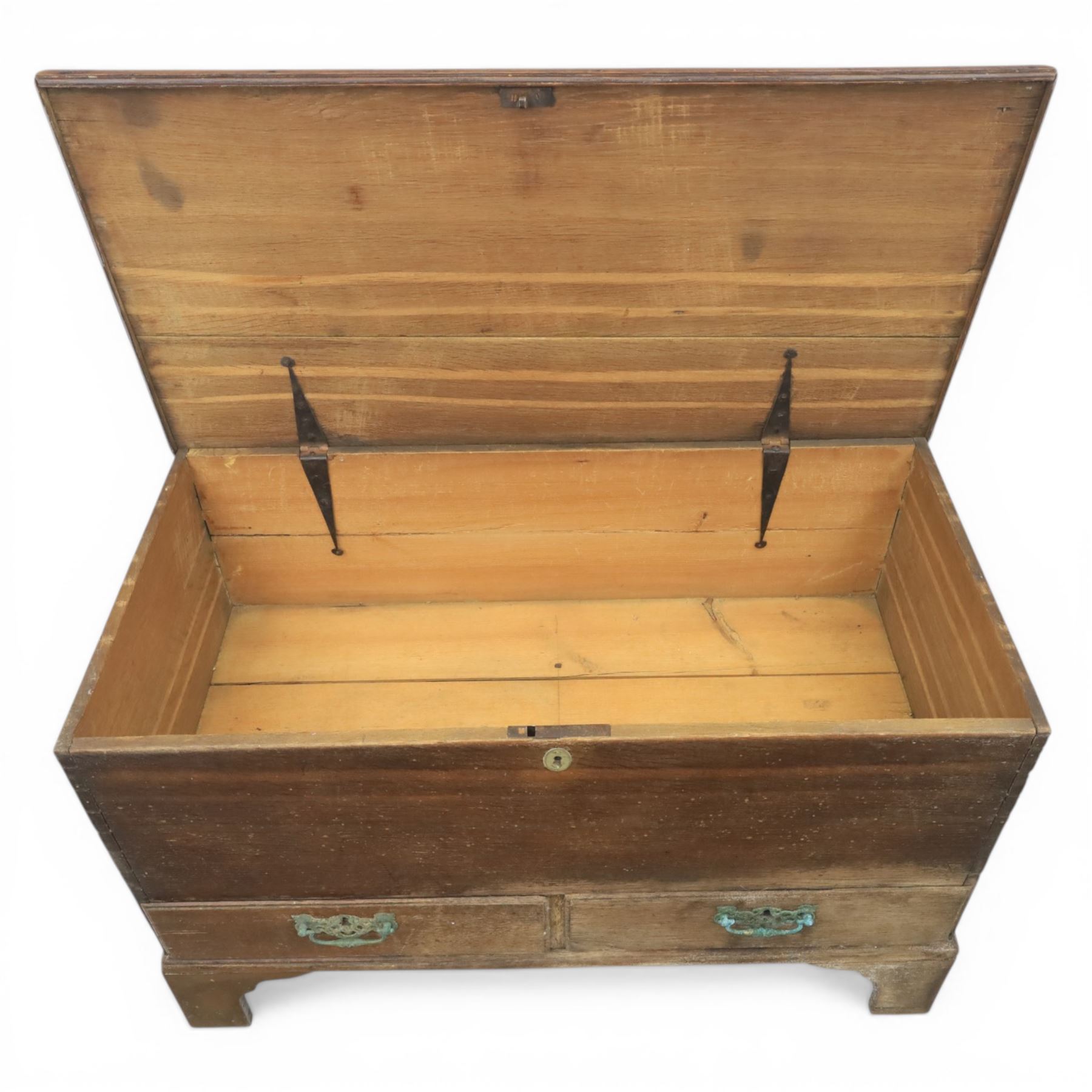 19th century oak mule chest, with lidded top above two short drawers, raised on bracket feet