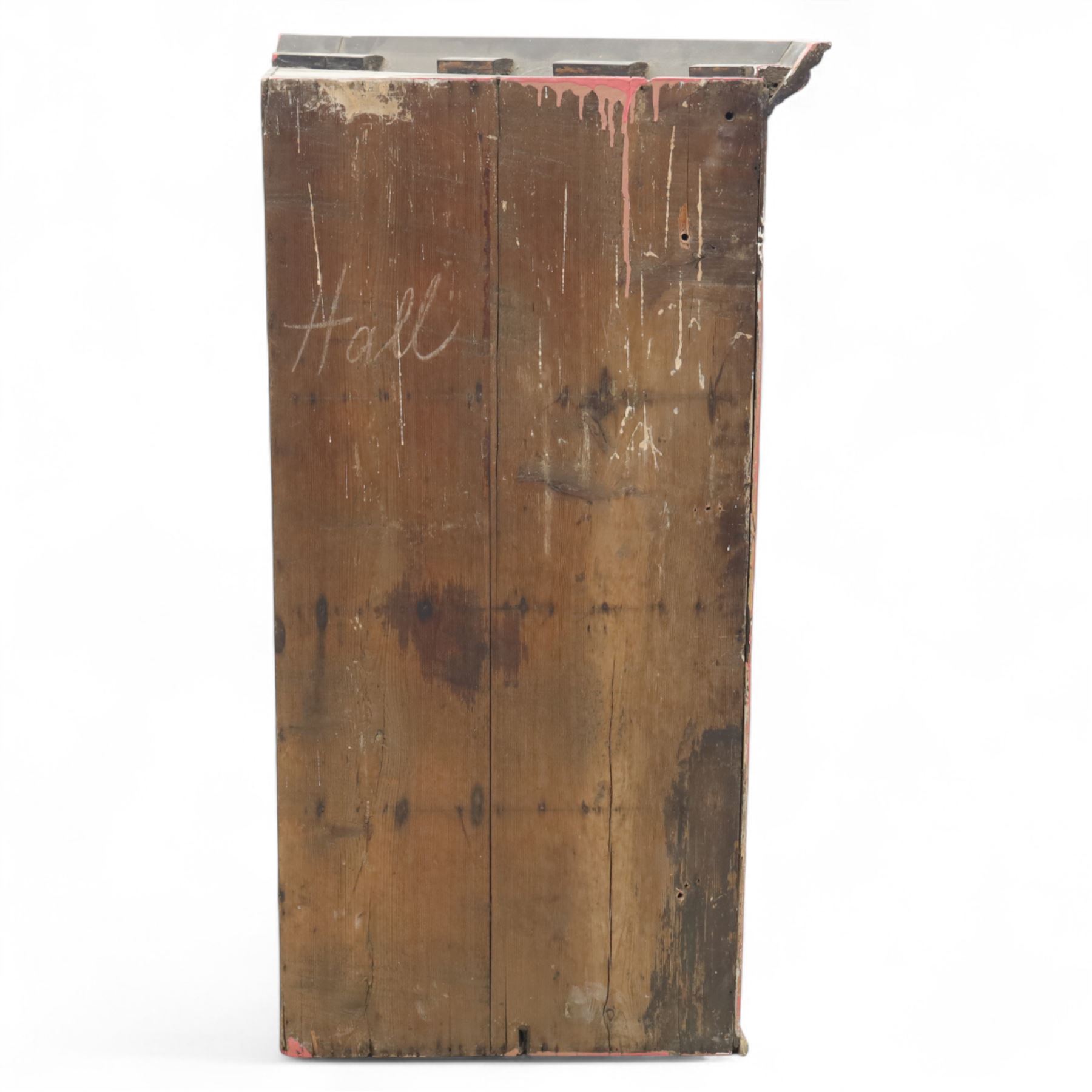 19th century oak wall hanging corner cupboard, moulded cornice above a panelled door enclosing shaped interior shelves, finished in green paint to the backboards