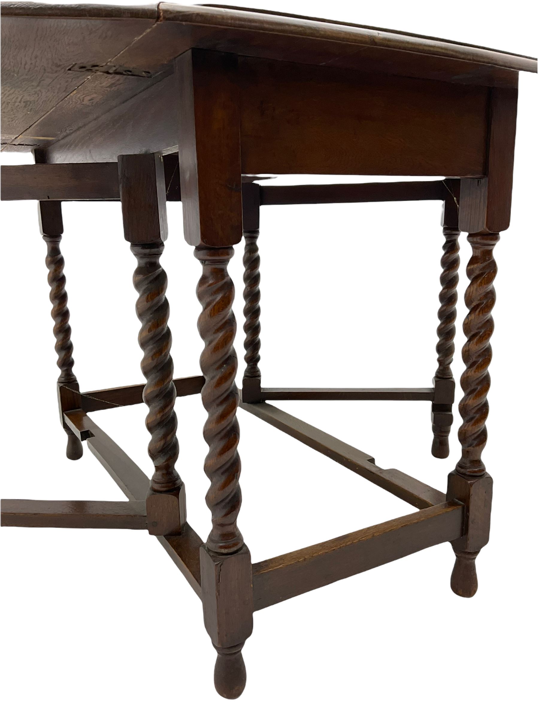 Early 20th century oak barley twist drop leaf dining table (105cm x 154cm, H74cm), and four chairs 