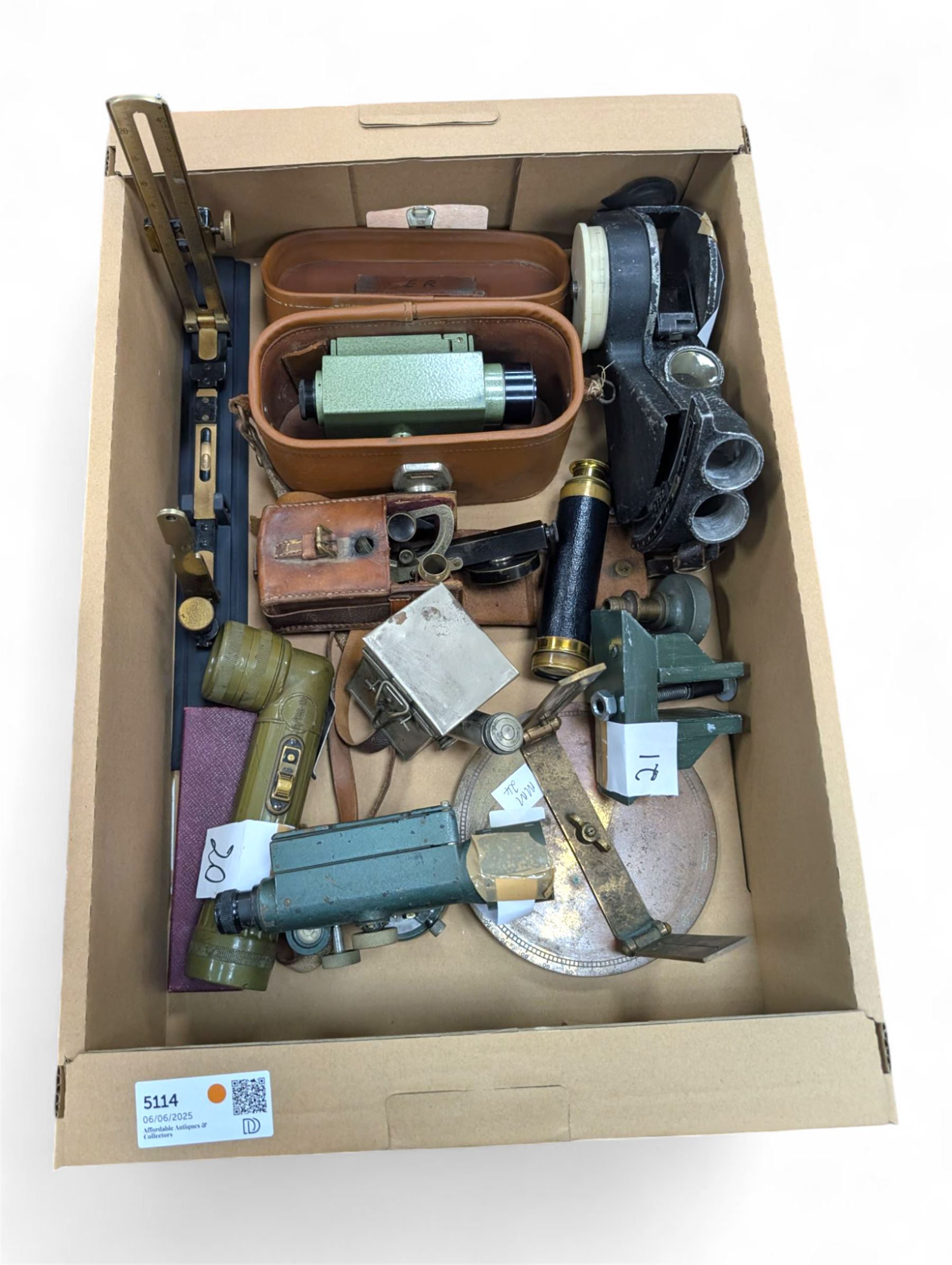 Two dumpy levels including Watts & Son ltd example and a Vickers Instruments example, US Navy bubble sextant, GT Price torch stamped US MX 991/U, 'The Unique' slide rule, three draw telescope and other instruments
