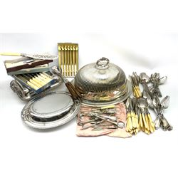 A silver plated part fluted meat dome with beaded rim, and unassociated Mappin & Webb base, together with two silver plated serving dishes and covers, one with oblique gadrooned detail, plus a quantity of mostly silver plated and ivory handled flatware. 