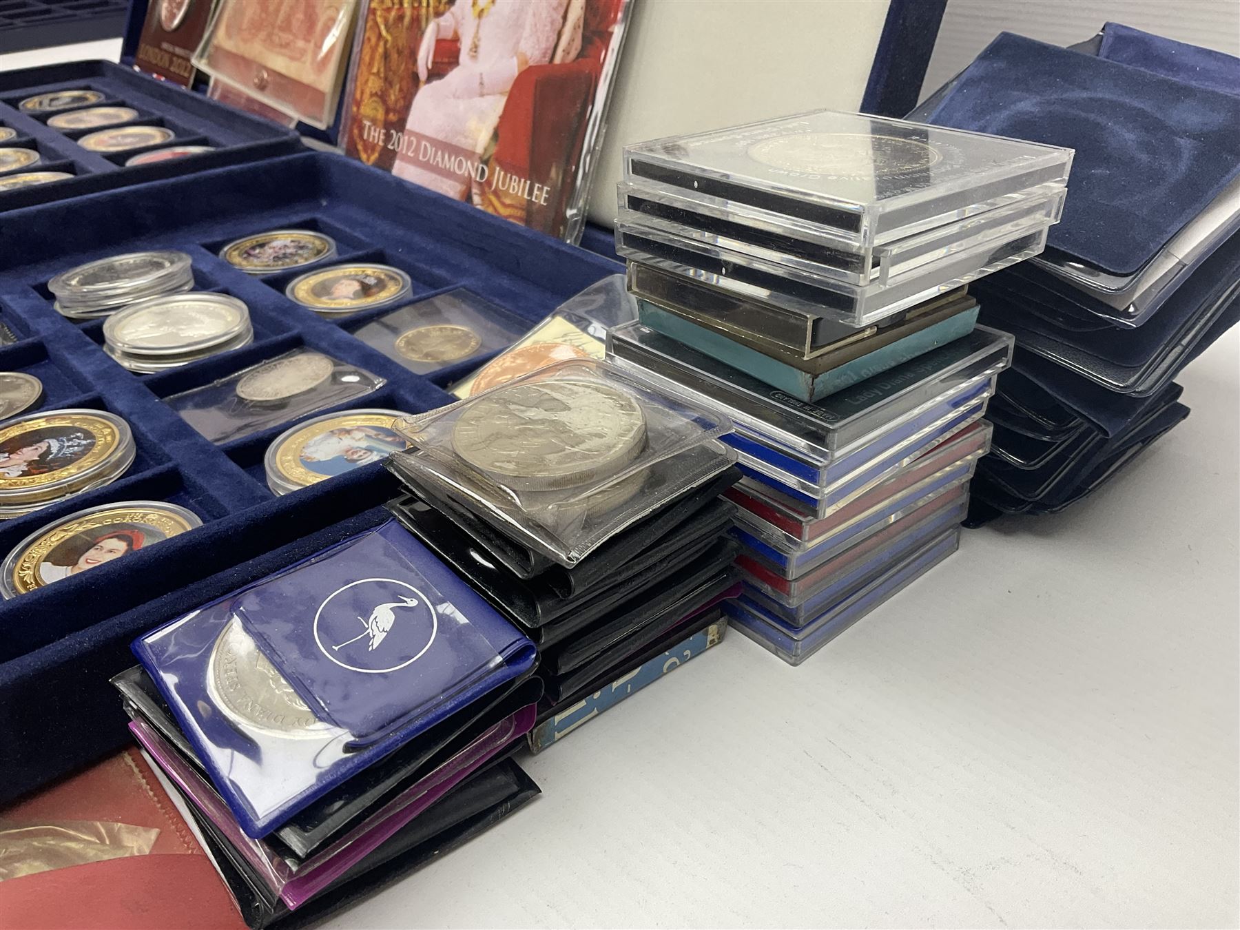 Mostly commemorative coins, including crowns, Queen Elizabeth II 2009 countdown to London 2012 five pound coin on card, 'The 2012 Diamond Jubilee' coin set in card folder, Cook Islands 2013 one dollar commemorating 'Coronation sixty years 1953 2013' etc