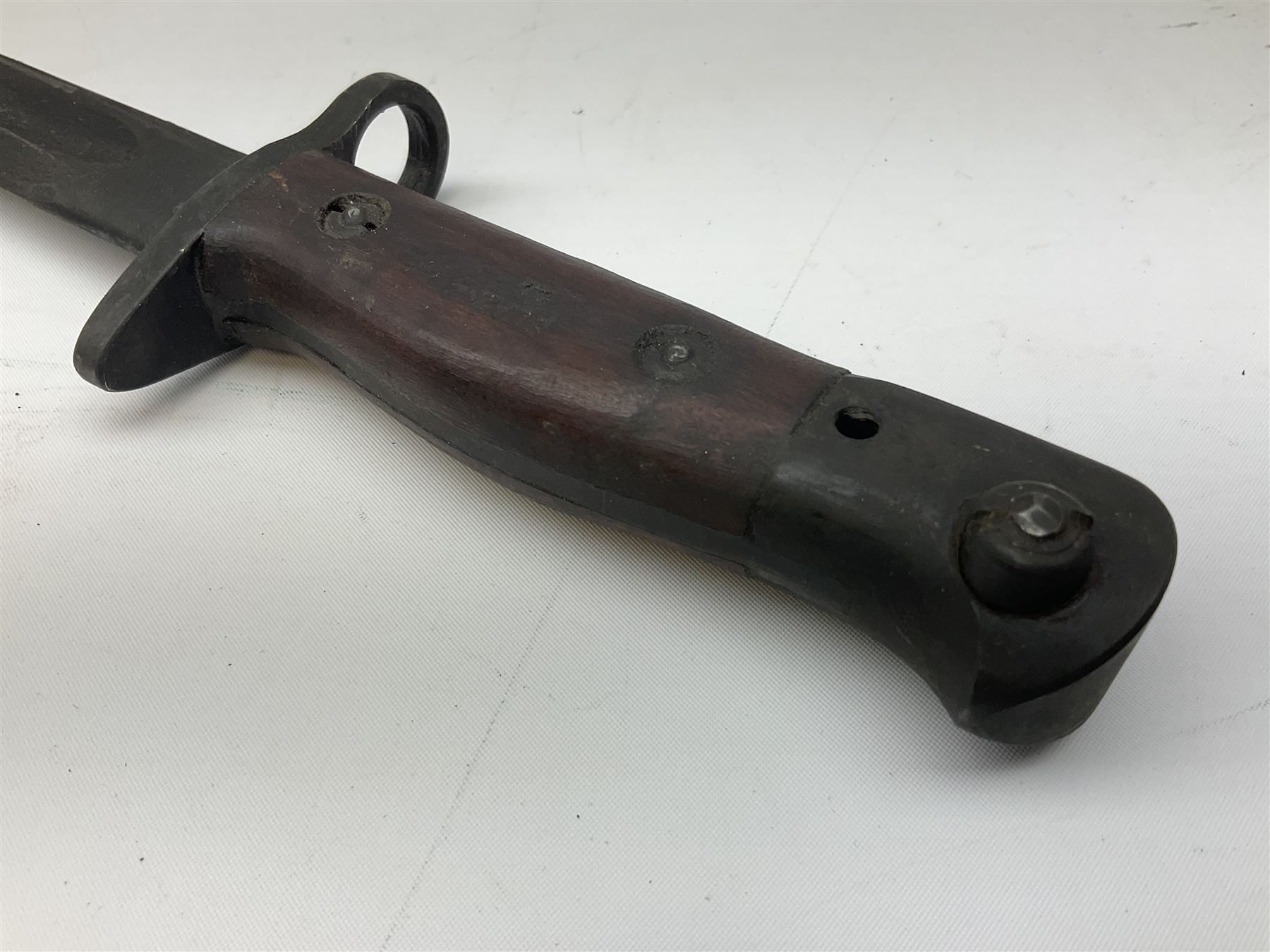 Australian Owen sub-machine gun bayonet, the 25.5cm fullered steel blade marked '53'; in metal bound wooden scabbard marled MA53 L41cm overall