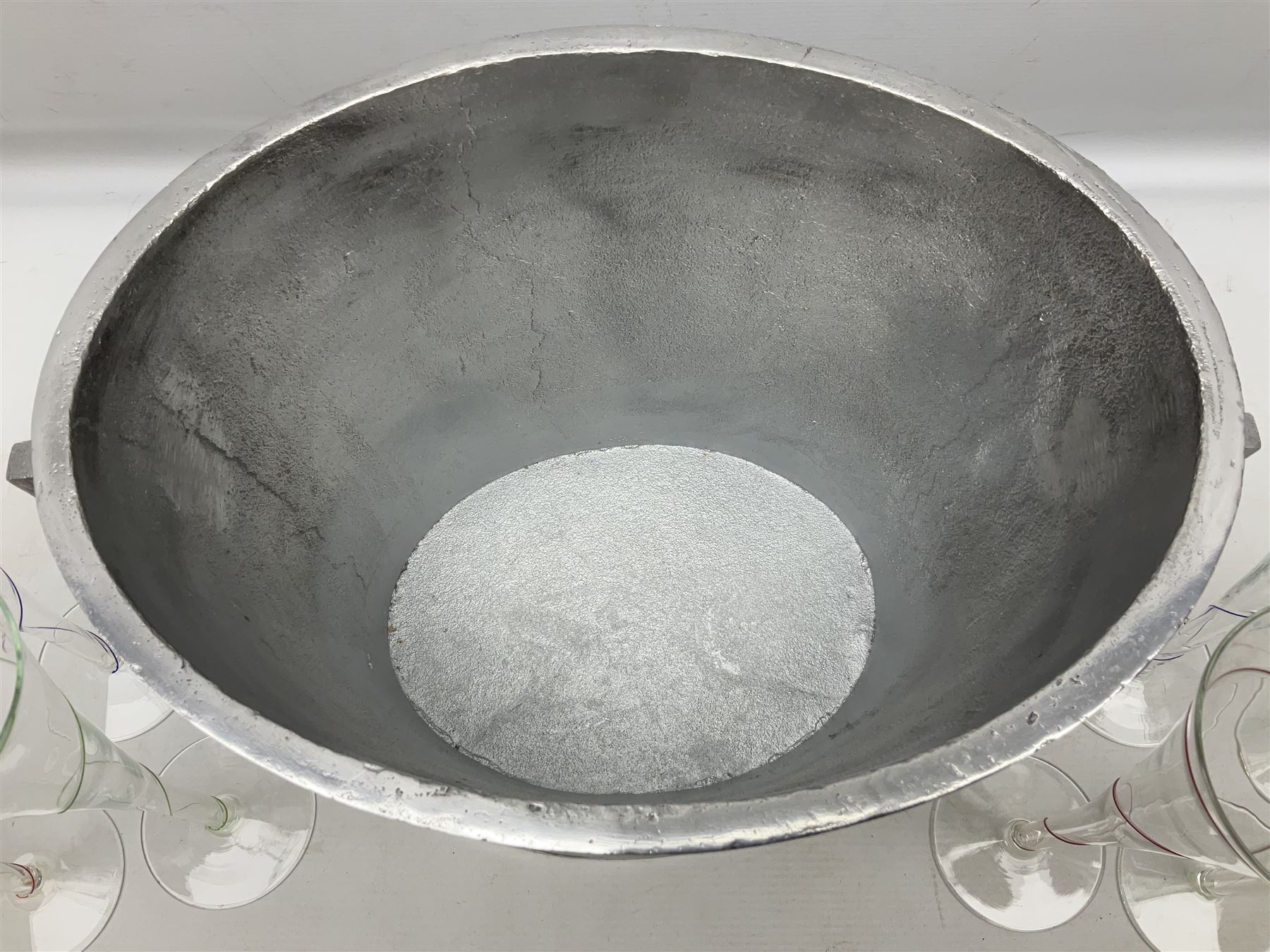 Aluminium champagne bucket detailed Cuvee de Prestige Champagne du Louvois, with twin ring handles, together with quantity of glasses, bucket L38cm
