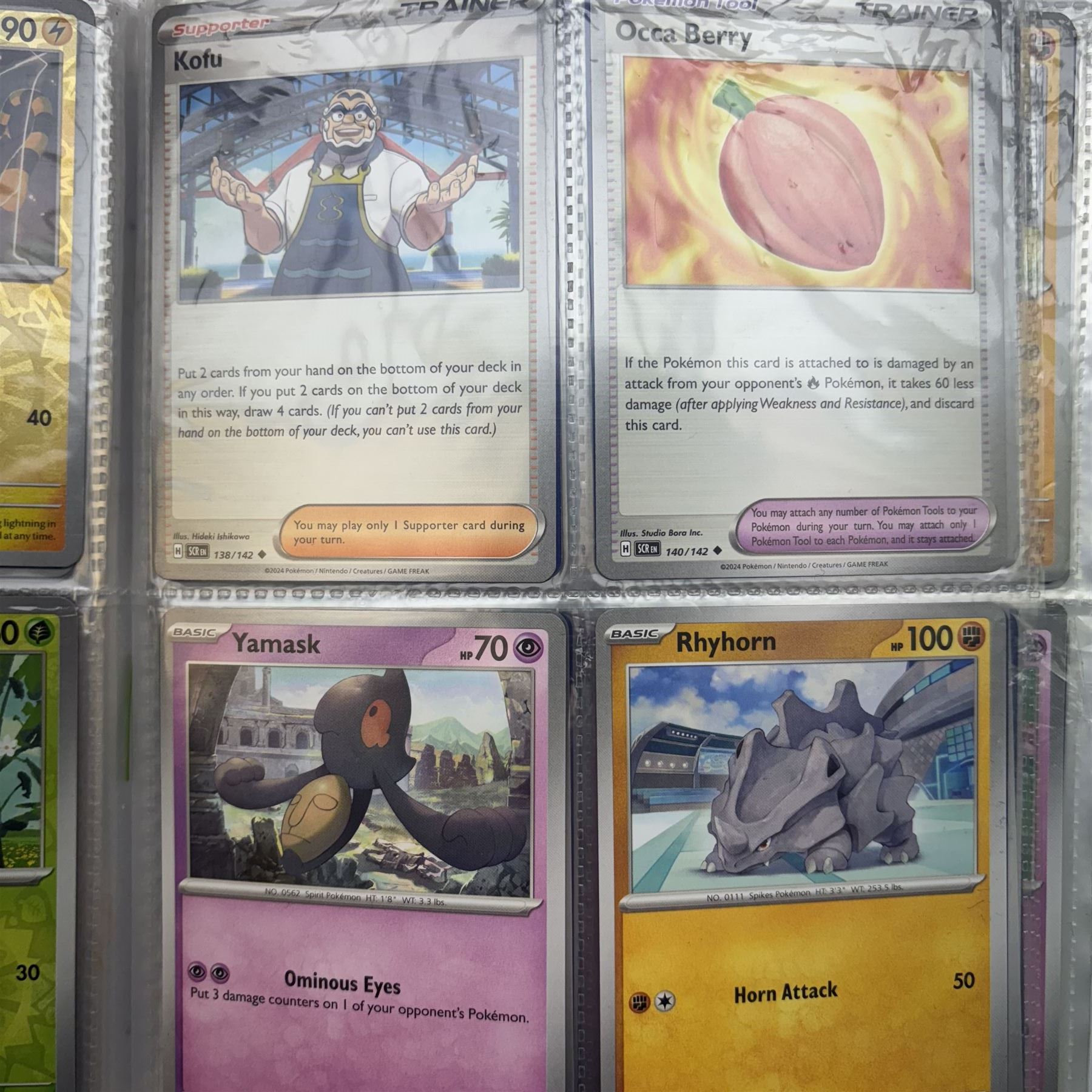 Collection of modern Pokemon TCG trading cards from the Scarlet & Violet and Sword & Shield eras, contained within in two folders, opened packets and loose, together with a graded Sword & Shield Silver Tempest Passiman TG08, GET Graded 9 Mint, two oversized cards, energy cards, vintage booklets and boxes, empty tins, 1998 Electronic Pokédex and other accessories