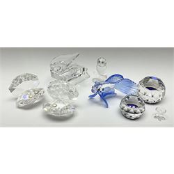 Six Swarovski crystal models, comprising an example modelled as a  Siamese fighting fish, two examples modelled as oyster shells with pearls, another modelled as a piano, plus a York Minster paperweight, Beverly Minster paperweight, and a Crystal Reflections model of an owl. 