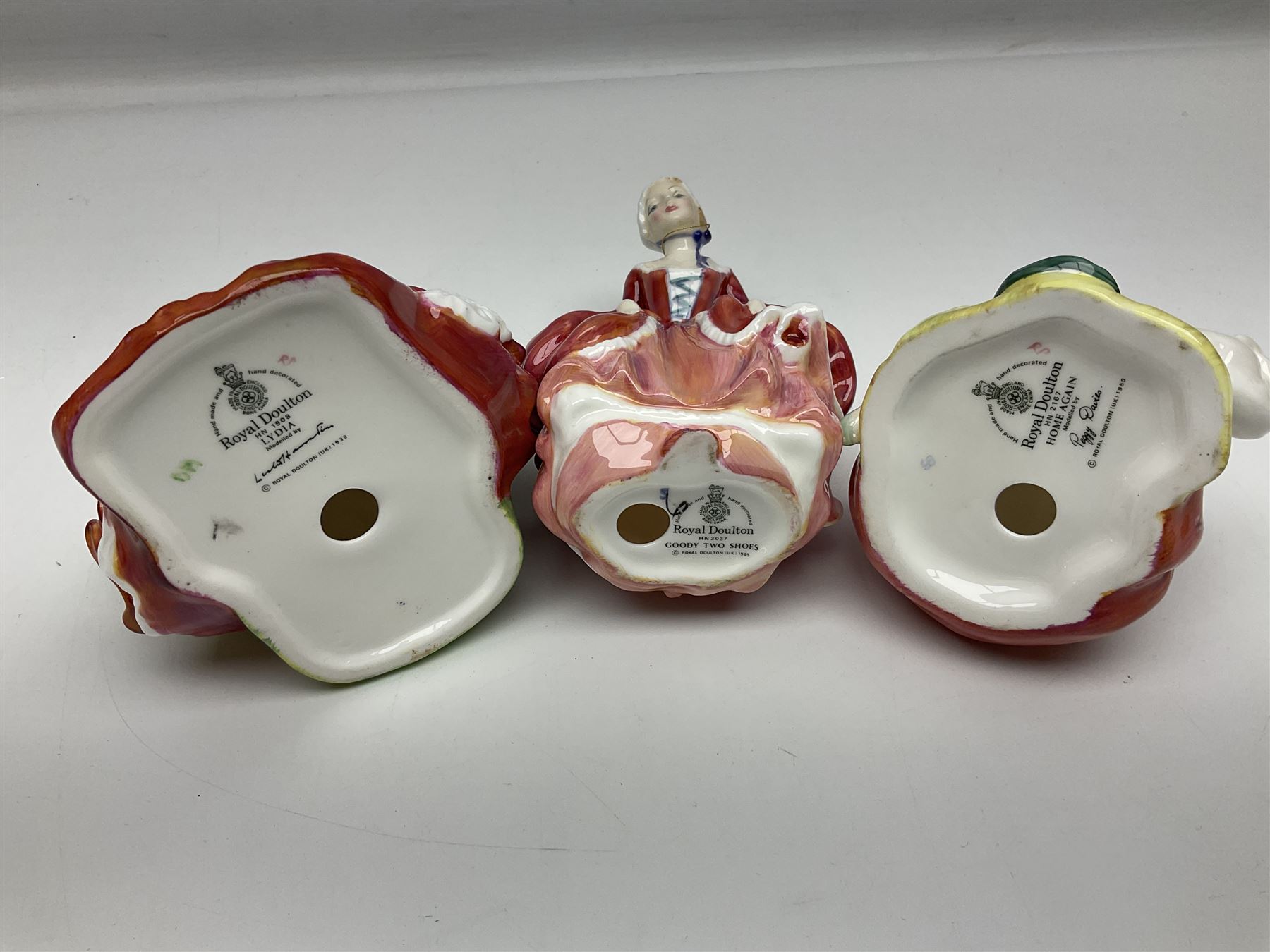 Ten Royal Doulton figures, to include Lydia HN1908, Goody Two Shoes HN2037, May HN2746, A Single red Rose HN3376, etc, nine with original boxes 