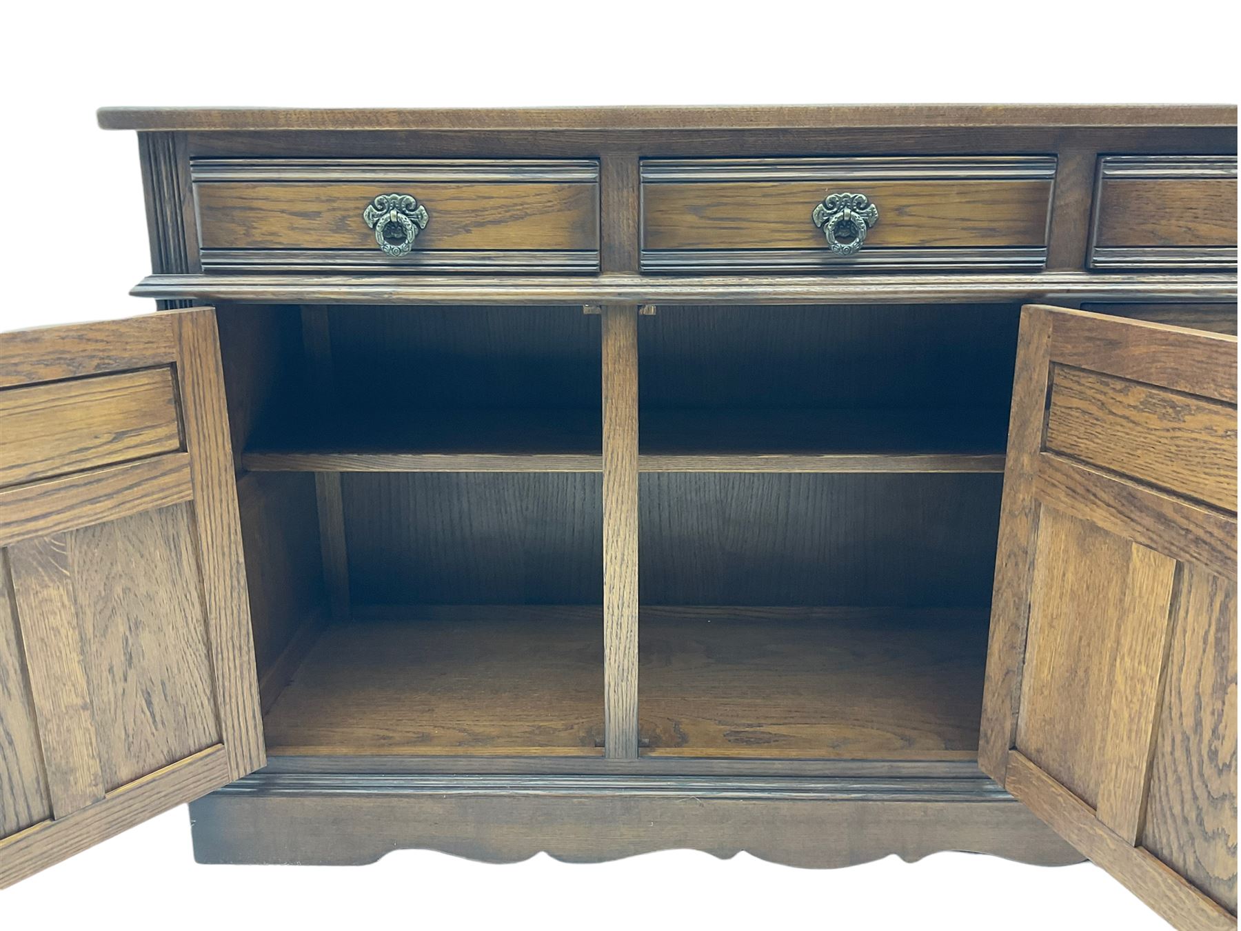 Old Charm Tudor style oak three drawer sideboard