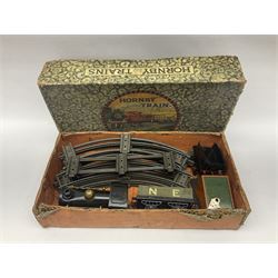 Hornby ‘0’ gauge - No. 0 Goods Set box containing clockwork LNER 0-4-0 locomotive with matching tender no.2710 in black and gold, originally from the No. 1 Goods Set; with NE open wagon, quantity of track, track clips, buffer and key 