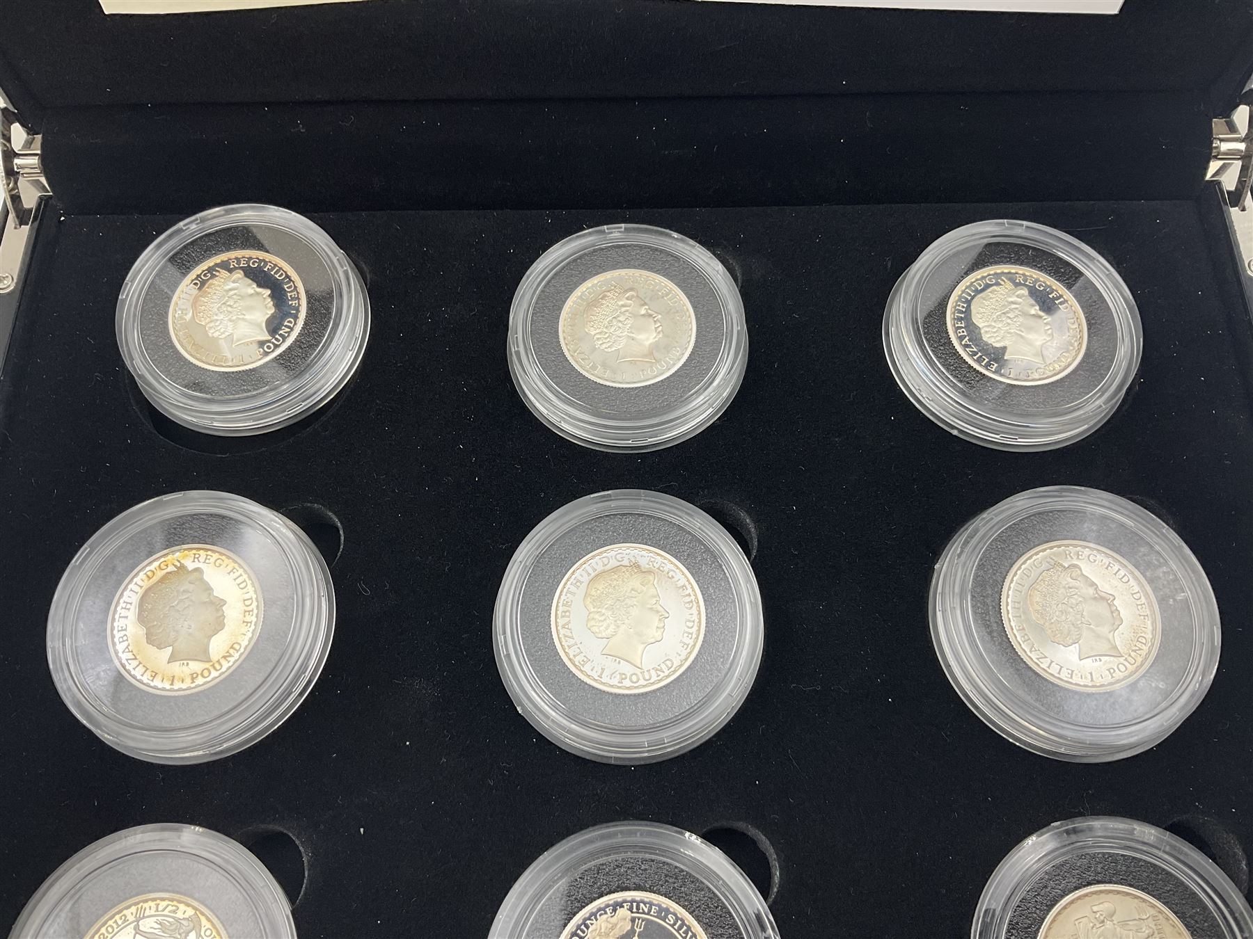 The Royal Mint United Kingdom 2012 'Britannia 25th Anniversary 1987-2012 The Silver Portrait Collection First Strikes' comprising nine half ounce fine silver Britannia coins, cased with certificate