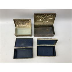 Collection of 20th Century and later Japanese metal cigarette boxes, to include examples highly decorated in relief, decorated with Chrysanthemum flowerheads, dragons, cranes, etc, together with other Japanese boxes (17)
