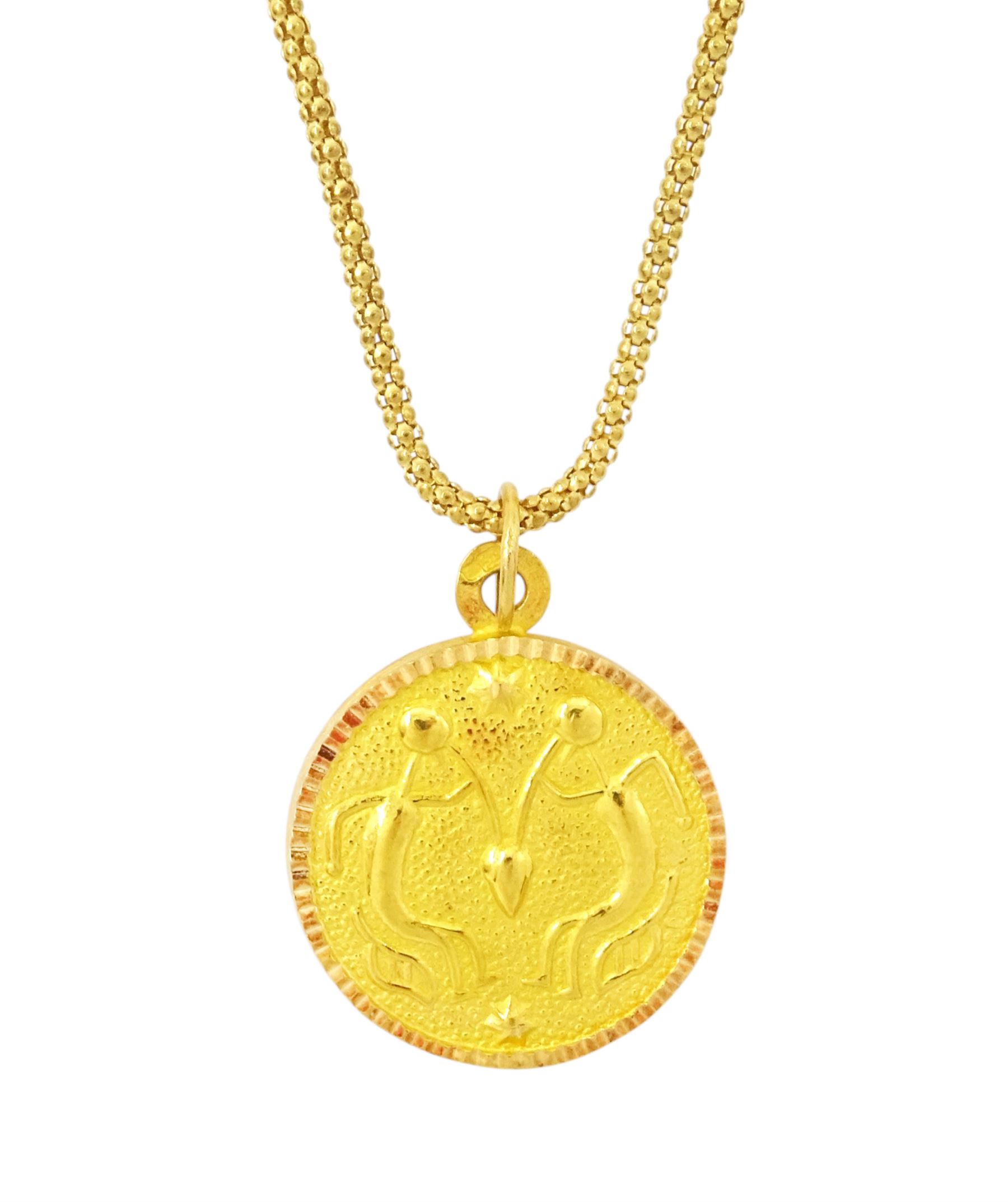 21ct gold Taurus pendant, stamped 875, on 18ct gold popcorn link chain necklace, stamped 750