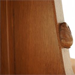 Rabbitman - circular oak dining table, adzed oak octagonal concave dining table, raised on a cruciform base, the supports and sledge feet also adzed, carved with rabbit signature, by Peter Heap of Wetwang