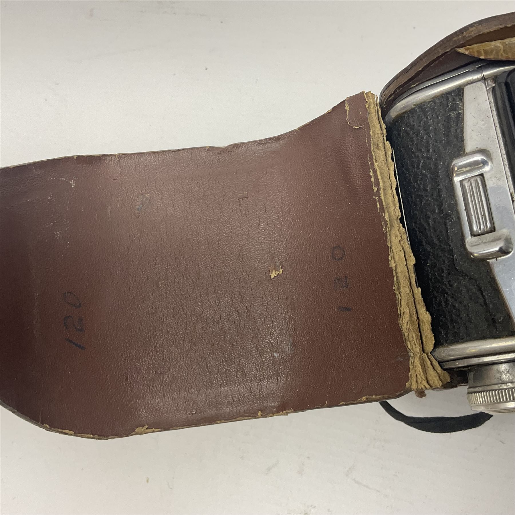 Franke & Heidecke Rolleicord twin lens camera, serial number 012706 with Heidoscop-Anastigmat f=7.5cm' lens and a 'Carl Zeiss Jena Triotar 1:4.5 f=7.5cm' lens, serial no 1474898, together with three similar cameras, including SEM TLR, serial no 420218, Ising Pucky box and Ferrania Elioflex, three in leather carry cases