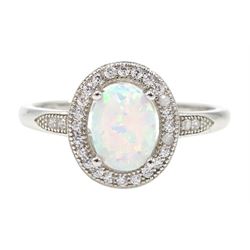 Silver opal and cubic zirconia ring, stamped 925