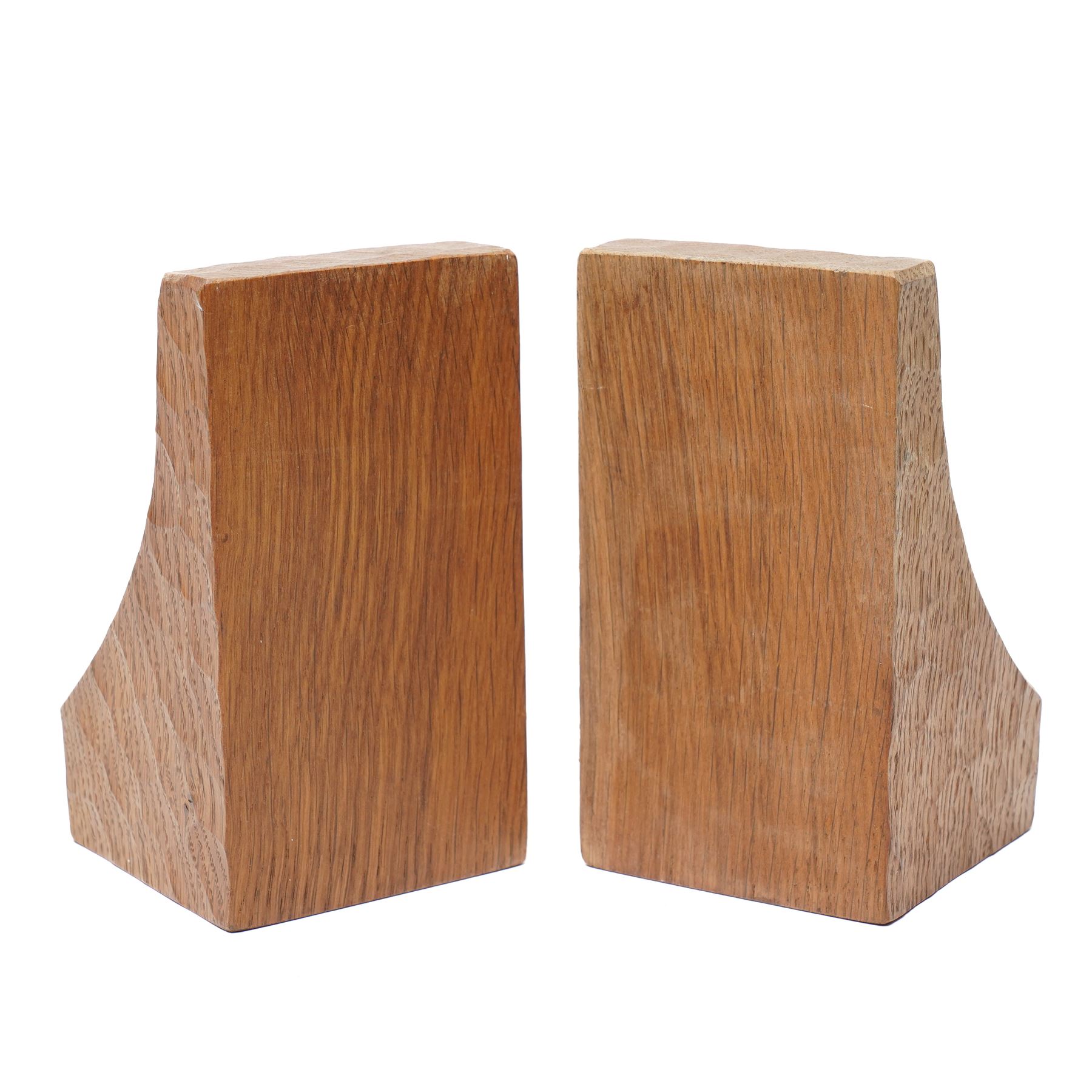 Mouseman - pair of adzed oak bookends with carved mouse signature H15cm by the workshop of Robert Thompson, Kilburn