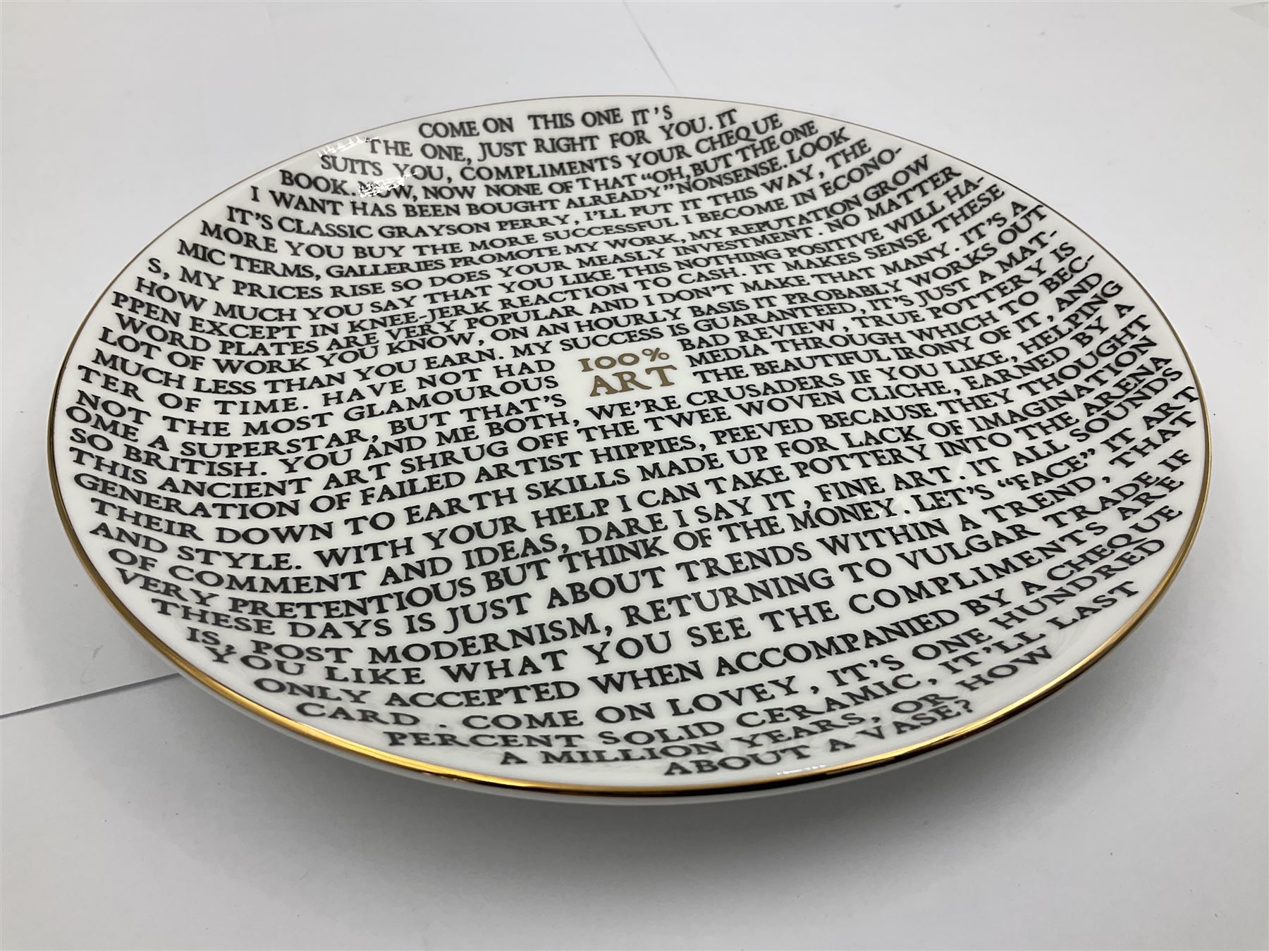 Grayson Perry (British 1960 -): ‘100% Art’, set of three ceramic plates, each with artist's seal printed to base and individually marked either with York Art Gallery, Sainsbury Center or The Holburne Museum