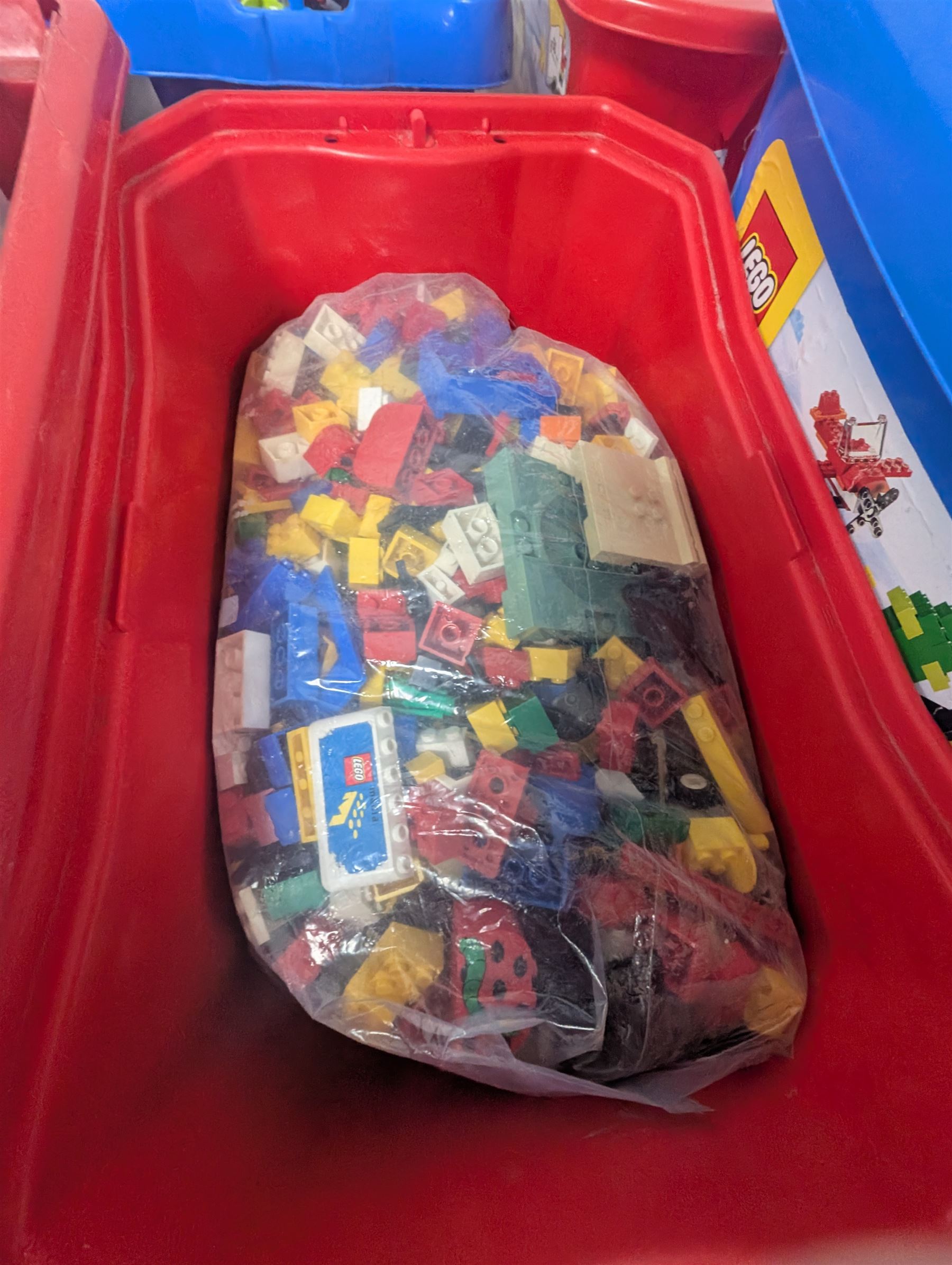 Large collection of loose Lego in six coloured plastic boxes