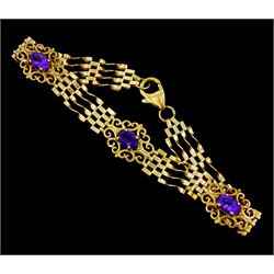 9ct gold three stone oval amethyst gate bracelet, stamped 375, with additional heart locket clasp