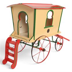 G & J Lines wooden gypsy caravan model, painted in cream with red roof, wheels and green detailing, H51cm, L89cm