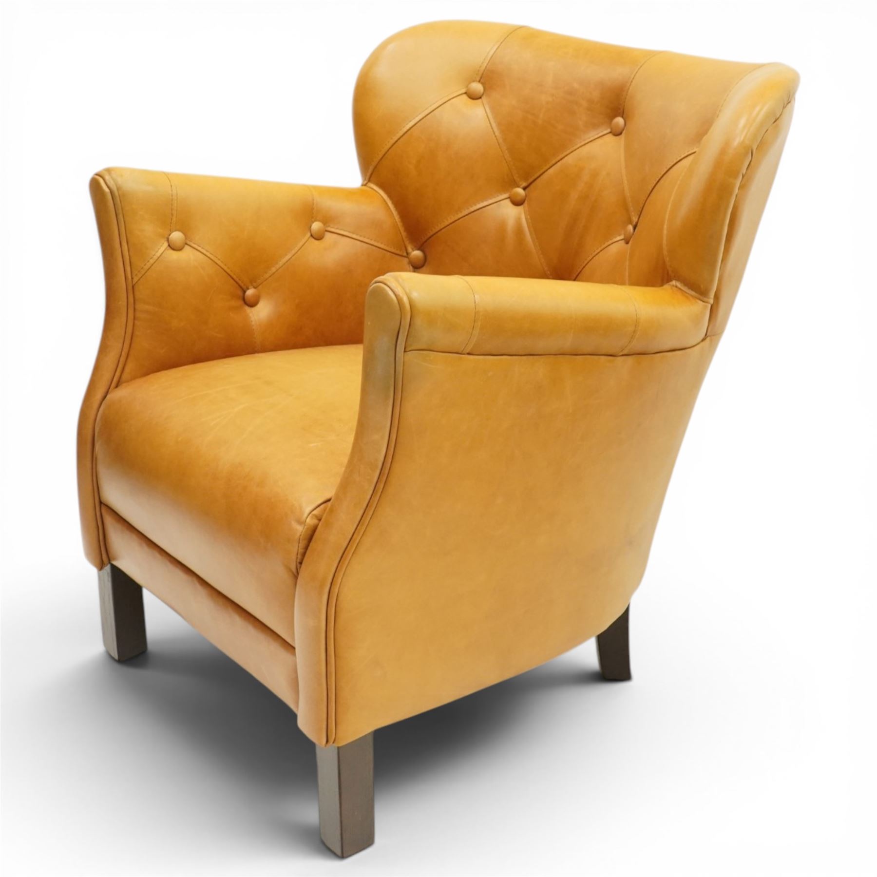 John Lewis - Pair of ochre leather tub chairs, downswept arms, button back and arms, raised on dark supports 