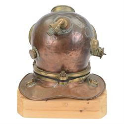 19th century Franz Clouth three bolt copper and brass diving helmet, inscribed 'Franz Clouth Kncinische Gummiwaarenfabrik m b H COLN NIPPES', matching numbers T A 7 on top and corselet rims, with handmade wooden stand, together with a reference book 'Diving Helmets' by Anthony Pardoe, which features the helmet on pages 146 and 147, helmet W42cm, H40cm, H50cm

