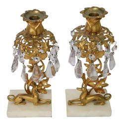 Pair 19th century gilt candle lustres, with recumbent grey hounds, below a leaf stem with flower bud sconce, H25cm