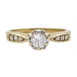 9ct gold single stone round brilliant cut diamond ring, with diamond set shoulders, hallmarked