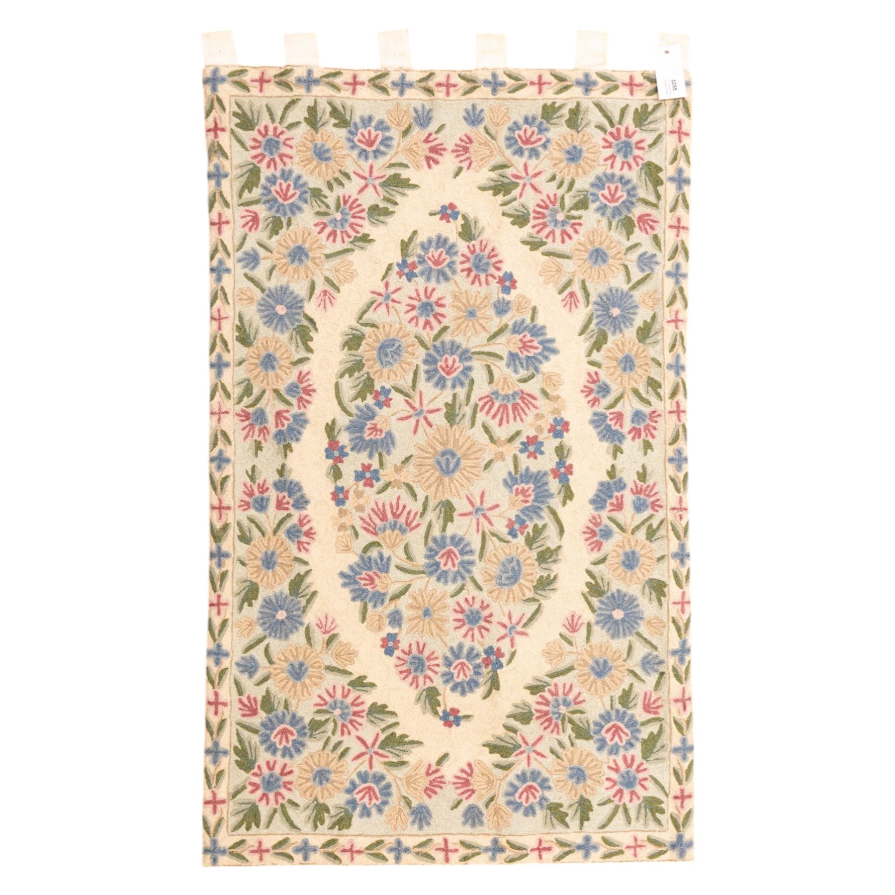 Kashmiri chain stitch crewel embroidered wall hanging, wool on cotton ground, decorated with an all-over lattice of floral medallions and stylized foliage with multiple floral borders