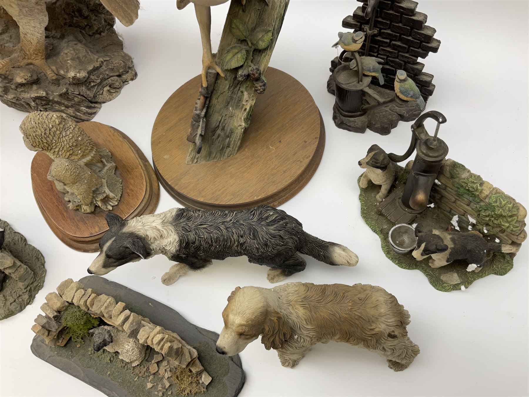 Leonardo Collection figures to include Spaniel, Border Collie, 'Nature Studies' and 'Farmyard Friends', a collection of figures including three owls a robin and a selection of farmyard scenes  