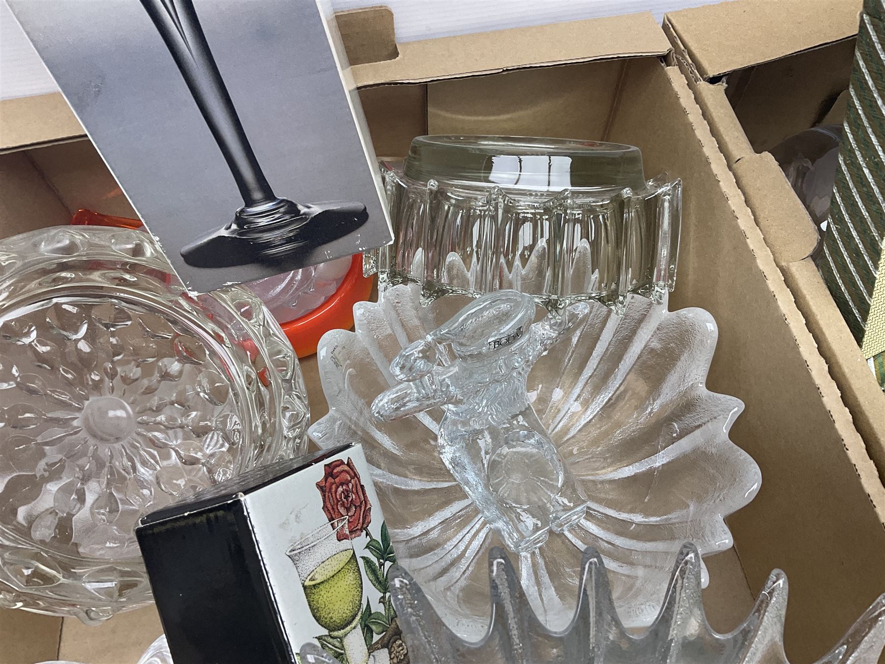 Dartington Crystal glass flower bowl, together with four similar smaller examples, two Orrefors glass bowls, collection of glass decanters, including Dartington and painted example, etc