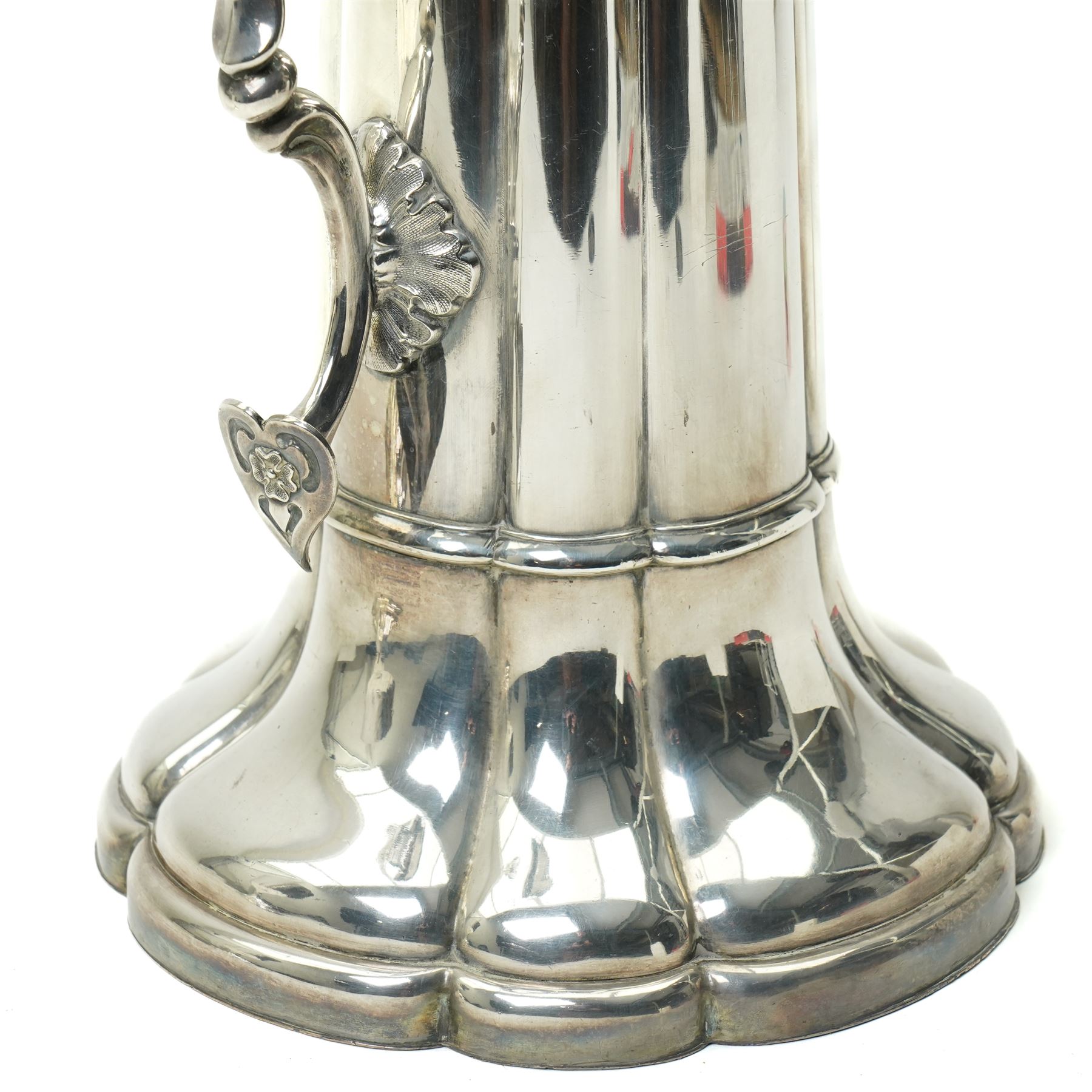 Large silver plated flagon probably by James Dixon with tapering lift, scroll handle and spreading lobed base H37cm, plated chalice with gilded interior by the same maker H21cm, plate chest with baize lined interior and countersunk handles W52cm and a pine stationery box