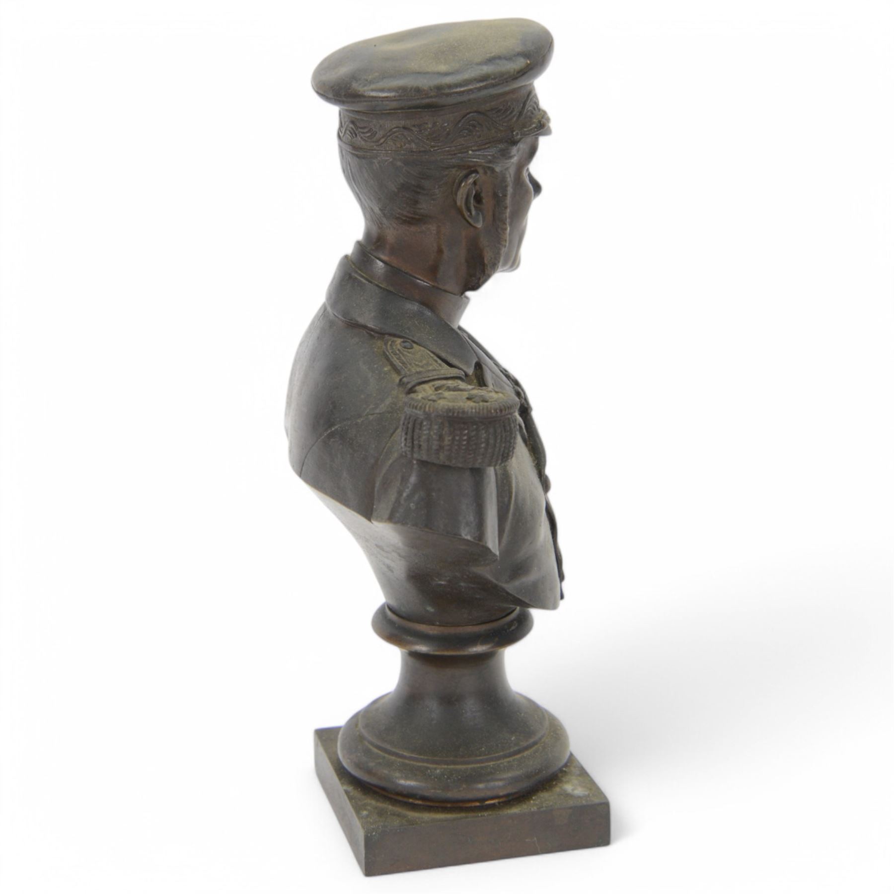 Bronze bust of a male figure in military dress, H24cm