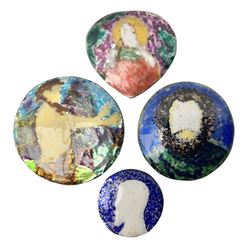 Henry George Murphy (1884-1939), four Arts & Crafts enamel panels, of shield form of circular and oval form, each decorated with a stylised portrait, largest example D5cm  